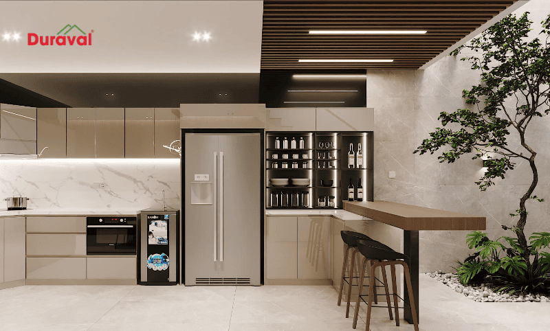 Quầy bar mini tạo thành một vách ngăn giữa phòng bếp và phòng khách